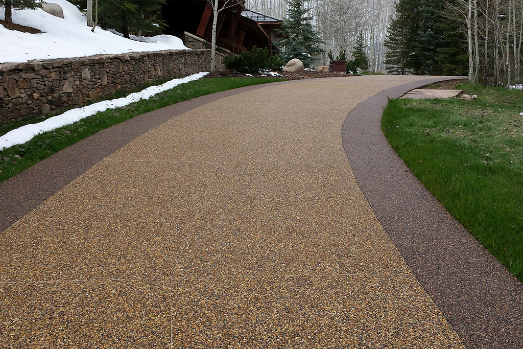 Beautiful polyaspartic top coat finish on a curved walkway.